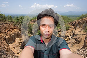 Man Selfie with Doi Tok grand canyon in Mae Wang national park