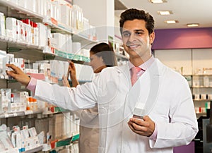 Man seller at the chemists shop