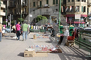 A man selling revolution souvenirs in cairo egypt