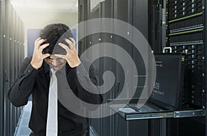 Man serious fail in data center with trouble of server photo