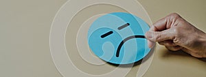 man setting a sad face, web banner format photo