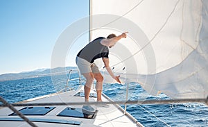 Man setting sail on his boat