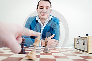 Man setting woman checkmate