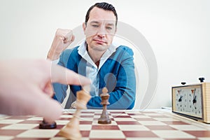 Man setting woman checkmate