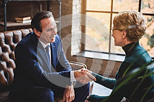 Man shaking hands with advisor