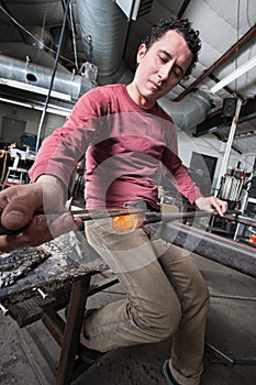 Man Shaping Glass Art