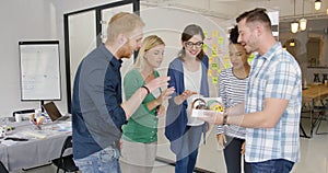 Man sharing with colleagues photo