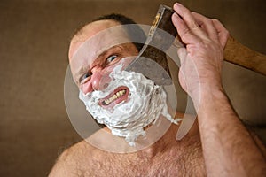 Man shaves with an ax