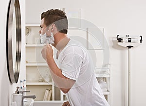 Man Shaving Face