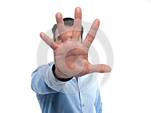 Man shielding with hand photo