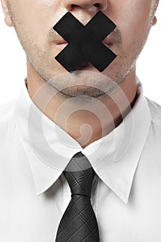 Man in shirt and tie with closed mouth isolated