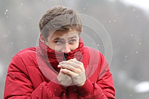 Man shivering in cold winter