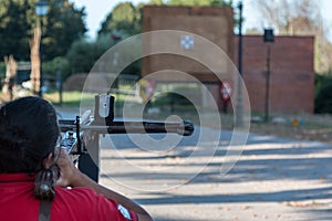 Man Shooting Arrow on Target, Training with Crossbow