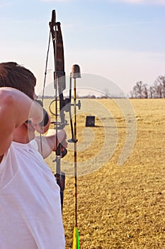 Man shooting bow photo