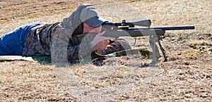 Man Shooting Rifle