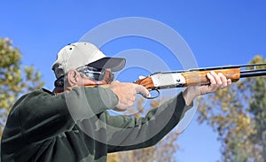 Man Shooting Shotgun