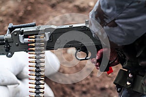 Man shoots from the weapon photo