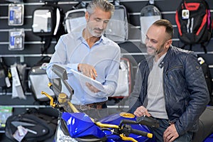 Man shopping for motorcycle