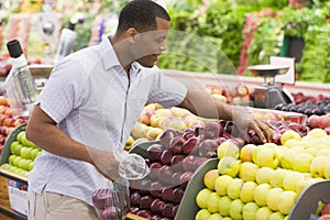 Man shopping in produce section