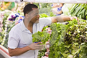 Man shopping in produce section