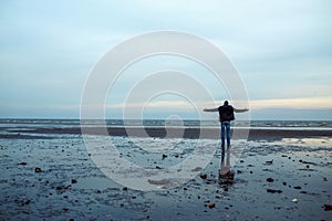 Man on the shore of Azov Sea photo