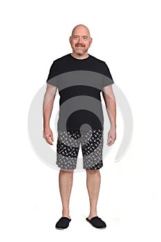 Man in short pant pajamas on white background