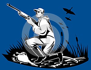 Man with shotgun duck hunting