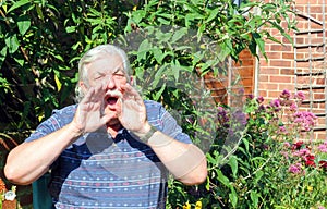 Man shouting.