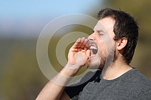 Man shouting loud in nature