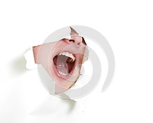 Man shouting loudly through hole in paper