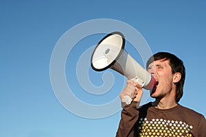 Man Shouting Through Megaphone