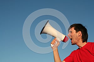 Man Shouting Through Megaphone