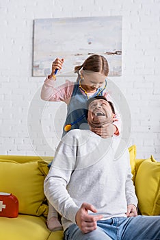 man shouting while pretending scared near