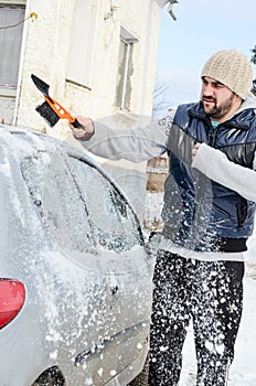 Man shovelling and removing snow