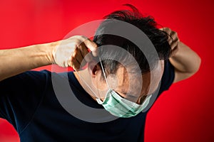 Man show wear mask for prevent virus infect photo