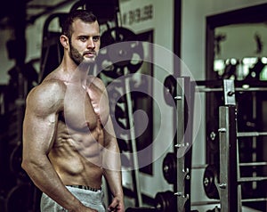 Man showing abs in gym