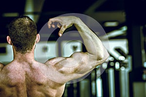 Man showing back in gym