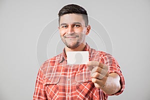Man showing blank business card