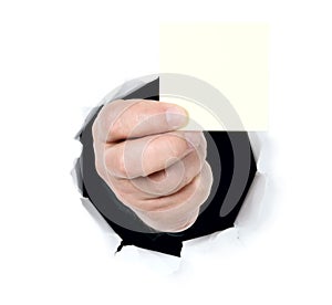 Man is showing blank card through a hole