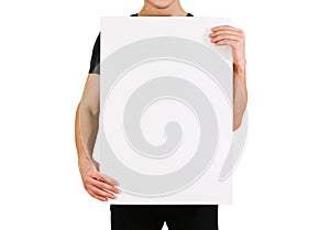 Man showing blank white big A2 paper. Leaflet presentation. Pamphlet