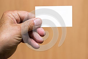 Man showing blank white business card