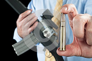 Man showing bullet