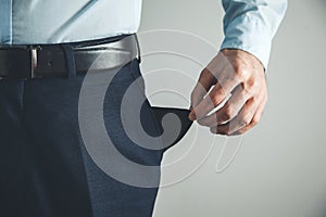 Man showing empty pocket