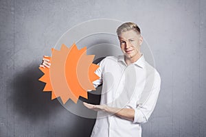 Man showing empty signboard with space for text.