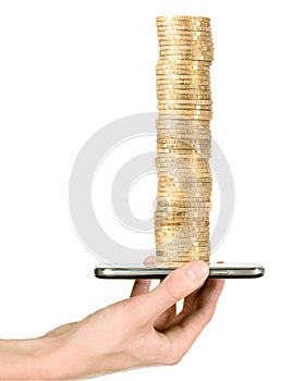 Man is showing golden coins through mobile phone