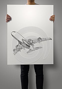 Man showing hand drawn airplane