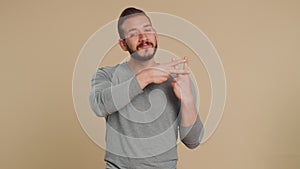 Man showing hashtag symbol with hands, likes tagged message, popular viral content, sign to follow