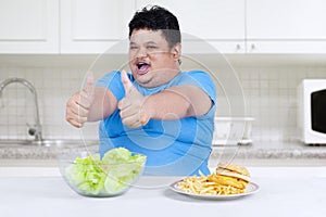 Man showing healthy and unhealthy food 2