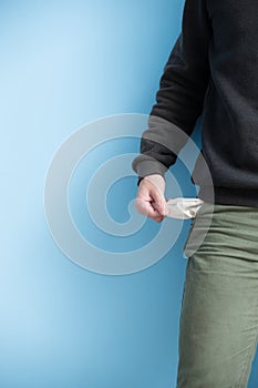 Man showing his empty pockets