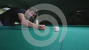 Man Showing His Girlfriend Where To Hit The Ball - Young Woman Receiving Advice On Shooting Pool Ball While Playing